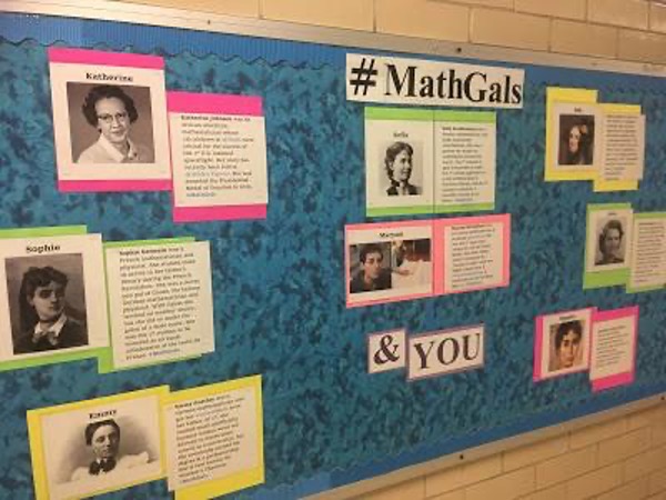 MathGals and You Poster with women in math history on a poster board hanging in a school hallway